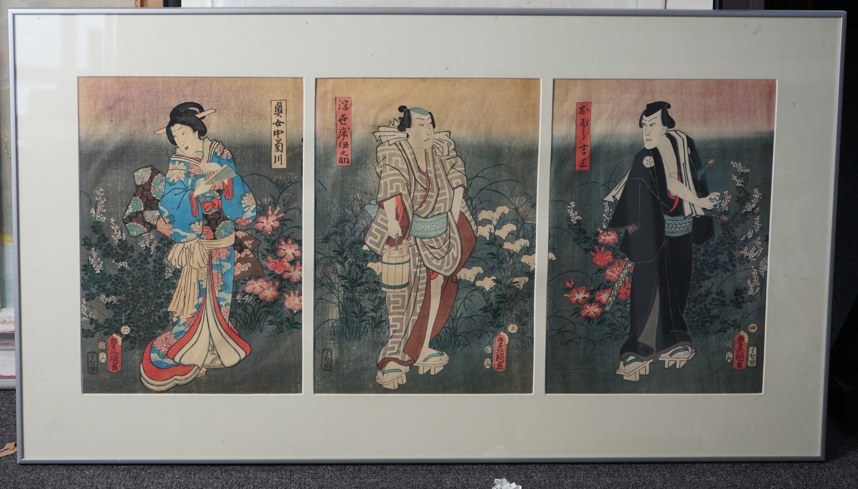 Kunisada Toyokuni III (1786-1864), Three actors standing in gardens, woodblock triptych, each 35 x 24cm